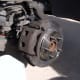 Caliper assembly re-installed.