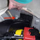 Bolt holding the square cooling vent in place. Remove this one and one nearer the center of the trunk and work the vent free