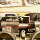 Remove the choke lever (circled in red).