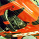Remove side covers from both sides of bike, they are held in place by two hex head bolts (circled in red).