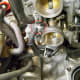 Remove fuel line (circled in red).
