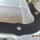 Start a few bolts to help keep the gasket in place.
