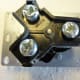 The back side, with the wire terminals, of a 30 amp outlet.