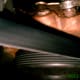 A serpentine belt running a water pump.