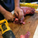 Cut between joints on the backbone with a knife.