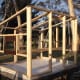 The frame of the hen house takes shape. We recycled one sheet of glass from an old oven door as a window. It is positioned at the height of the roosts, allowing us to check the chickens at night by shining a torch in.