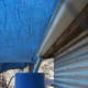 Shade cloth for summer protects the entry ramp from excessive heat and also keeps their water tank shaded.