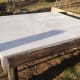 The new hen house began with a raised platform at a convenient height for us to reach in and replace straw, and easily catch the chickens when necessary. No need to bend down to ground level. We painted the floor to seal it.