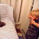 The kid is just jealous of this cat's natural camo colors.