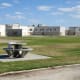 A typical yard with the housing units in the background.