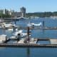 Float planes with Stanley Park in the background