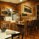 Modern appliances set off by reworked, traditional material creates an intriguingly contemporary, hybrid look.