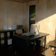 A simple, unadorned interior of a YardPod - great for small outdoor offices like this one.