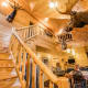 Homestead: cathedral-style great room and wooden bannister