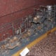 A diorama of the Model T assembly line. Model T Ford cars were manufactured from 1908 to 1927, and had no car fires, as far as I know.
