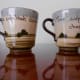 Here is the reverse side of the cups showing the hand written mottoes incised in the clay