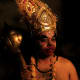 An actor dressed as Hanuman.