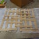We glued some popsicle sticks together for the schach (roof). What a pretty pattern!