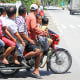 Riding a motorcycle or habal-habal in the Philippines.