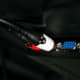 Plug in the red/white end of the RCA to the TV's RCA audio-out