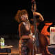 Esperanza Spalding quite often alternates between upright bass and bass guitar.