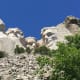 Over 400 men spent 14 years carving Mount Rushmore using dynamite to blast the granite and jackhammers and hand chisels for the detail work.