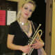 M-Law, has been playing trumpet for 15 years. She attended school at VCU and has played with different groups. M-Law, has her own band called "The Prophets of Jazz."