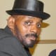 Denis Bradwell, is a member of Touch'e of Clazz. He has a powerful voice similar to that of Teddy Pendergrass.