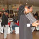 Line dancers enjoy steps to the music of various songs.