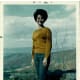 Never a hippie, my mother models a 1960s bouffant and more conservative styles of the era.