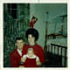 My parents celebrate my first Christmas.