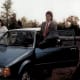 In the 1980s, cars were boxy, and men's styles (as modeled by my prom date) included thin ties and mullet hairdos.