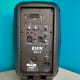 Back view, displaying a myriad of controls, indicators, and inputs