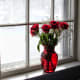 Six red roses mean that the giver desires to be loved. It is a way of asking someone to love you or to belong to you. The meaning is in the giver and not in the recipient.