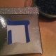 ... and affix to the box. Make sure you keep the cover on in order to center the letter properly.