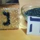 A dreidel box will come in handy. Decorate this one with white and colored rice.