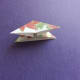 Fold all twelve squares into this collapsed triangle