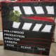 Make or buy a director's clapboard pinata.