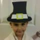 Glue or tape hat on white strip and fit to the size of your child's head.