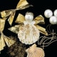 All it takes is some glue, glitter, ribbons and pearl baubles,