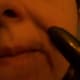 Making the creases with eye shadow.