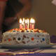 Nuts, candies, and vanilla frosting decorate this simple, fun cake.