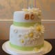 A daisy-themed cake for an 80-year-old.