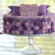 A flower-strewn birthday cake for a mother.
