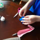 Tape or glue the ears to the back of your bunny shell.