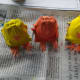 Chicks with beaks and feet.