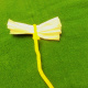 # 8 Tissue Paper Flowers-Using a facial tissue, showing the fold and the pipe cleaner stem.
