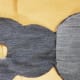 Continue hot gluing the sides of the bunny's head. Check your seams with your crafting stick.