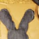Fill your bunny's head with poly beads to the desired level of plushness. Hot glue the two sections together to create a seam.