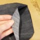 Continue hot gluing along the sides of your bunny's body, leaving a large enough hole to finish filling with poly beads.
